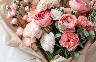 AI generated small flower bouquet and wrapping paper with flowers on white background isolated on white, photo