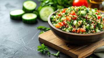 AI generated A Mediterranean-inspired tabbouleh salad with parsley, tomatoes, cucumbers, and bulgur wheat photo