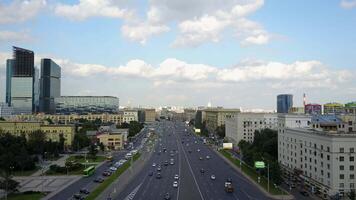 Aerial view of highway in the city. City road with cityscape and skyline. Transportation in modern city, Street light, light trails at morning on motorway, urban view at day video