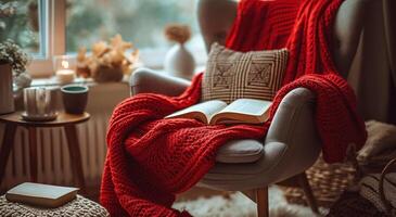 AI generated chair with red blanket and book photo