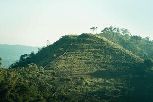 photo of mountains and blue sky in the morning. Sunrise over the hills