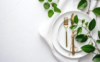 AI generated white table setting with green plant leaves photo