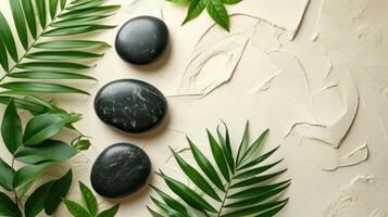 AI generated top view of three black stones and leaves on white background photo