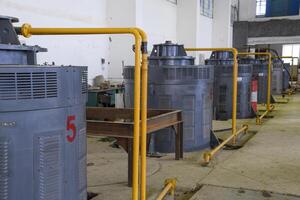 Engines of water pumps at a water pumping station. Pumping irrig photo