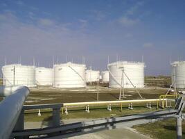 Tank the vertical steel. Capacities for storage of oil  products photo