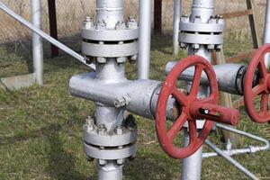 Shut-off valves on the high-pressure well flowing equipment. Oil equipment photo