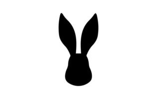 Silhouette of a rabbit head. Easter Bunny. Isolated on white background. A simple black icon of hare. Cute animal. Ideal for logo, emblem, pictogram, print, design element for greeting card vector