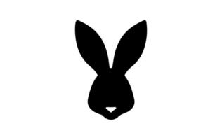 Silhouette of a rabbit head. Easter Bunny. Isolated on white background. A simple black icon of hare. Cute animal. Ideal for logo, emblem, pictogram, print, design element for greeting card, vector