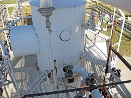 Technological columns of oil refinery. photo