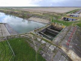 Water pumping station of irrigation system of rice fields. View photo