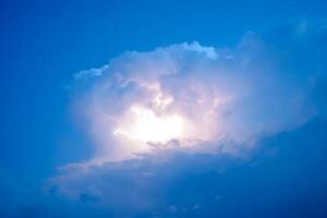 Lightnings in storm clouds. Peals of a thunder and the sparkling lightnings in clouds photo