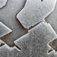 Hoarfrost on a rubber tire wheel photo