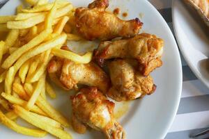 crispy coated fried chicken on a plate photo