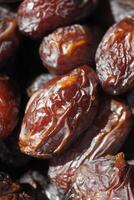 many date fruits display for sale at local market photo