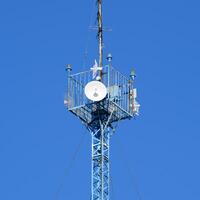 Mast tower relay Internet signals and telephone signals photo