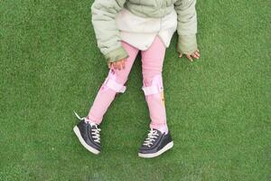 Child cerebral palsy disability, legs orthosis. photo