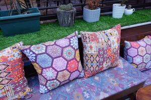 Colourful cushions on display for sale in a traditional Turkish Bazaar. photo