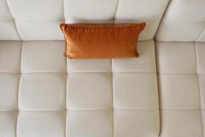 a texture of white sofa with buttons photo