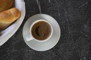 a cup of turkish coffee on table photo