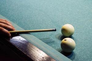 Billiards, billiard table. Targeting the cue in the ball for imp photo