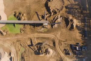 Aerial view of opencast mining quarry. Industrial place view from above photo