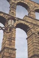 Roman aqueduct bridge of Segovia, Castilla Leon, Spain photo