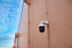 CCTV security camera operating outdoor photo