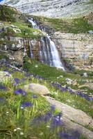 Waterfall de cotatuero under Monte Perdido at Ordesa Valley Aragon Huesca Pyrenees of Spain photo