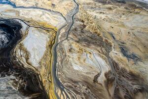 Aerial view of surrealistic industrial place. Human impact on the environment..Degraded landscape.Destroyed land.View from above. photo