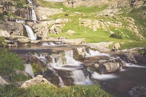 Waterfall de cotatuero under Monte Perdido at Ordesa Valley Aragon Huesca Pyrenees of Spain photo