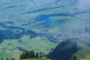 Hang glider, Ebenalp, Switzerland photo