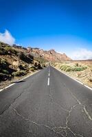 Desert Lonely Road Landscape in Volcan Teide National Park, Tenerife, Canary Island, Spain photo