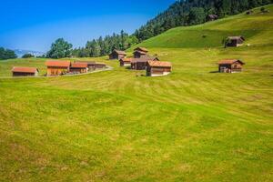 Wooden houses in Malbun in Lichtenstein, Europe photo