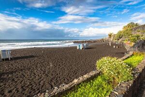 The coast of Atlantic ocean in Puerto De La Cruz, one of the most popular touristic towns, Canary islands, Spain photo