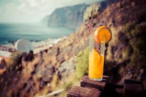 Orange juice glass photo