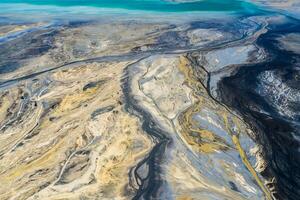 Aerial view of surrealistic industrial place. Human impact on the environment..Degraded landscape.Destroyed land.View from above. photo