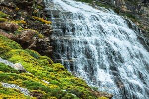 Cascada Cola de Caballo waterfall under Monte Perdido at Ordesa Valley Aragon Huesca Pyrenees of Spain photo