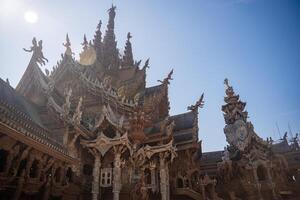 Sanctuary of Truth wooden temple in Pattaya Thailand is a gigantic wood construction located at the cape of Naklua Pattaya City. Sanctuary of Truth temple. photo