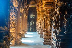 Pattaya, Thailand - December 31, 2023. Interior of Sanctuary of Truth wooden temple in Pattaya, Thailand. Sanctuary of Truth temple. photo