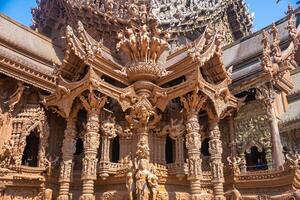 Sanctuary of Truth wooden temple in Pattaya Thailand is a gigantic wood construction located at the cape of Naklua Pattaya City. Sanctuary of Truth temple. photo