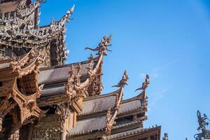 Sanctuary of Truth wooden temple in Pattaya Thailand is a gigantic wood construction located at the cape of Naklua Pattaya City. Sanctuary of Truth temple. photo