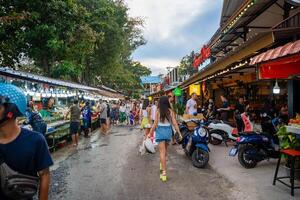 Phuket, Thailand - December 19, 2023. Trade in seafood at the market in Rawai, tourists buy seafood at the seafood market. High quality photo