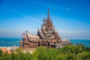 Sanctuary of Truth wooden temple in Pattaya Thailand is a gigantic wood construction located at the cape of Naklua Pattaya City. Sanctuary of Truth temple. photo