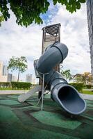 Playground on roof of one of building in Georgetown, Malaysia, concept for fun and safety of children. photo