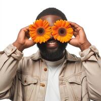 ai generado africano americano hombre cubre ojos con dos naranja gerberas foto