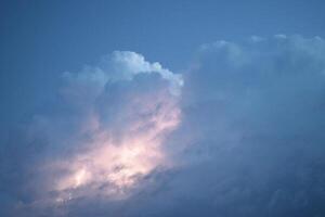 Lightnings in storm clouds photo