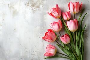 ai generado rosado tulipán ramo de flores con espacio para texto en rosado superficie foto