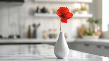 ai generado un minimalista florero con uno rojo flor soportes en un blanco mármol mesa foto