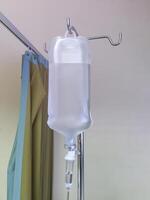 saline bag in emergency room at hospital photo