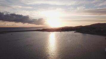 Aerial shot of tropical ocean, sea sunset - Fly over Ocean. Stock. Golden magic hours in open sea video